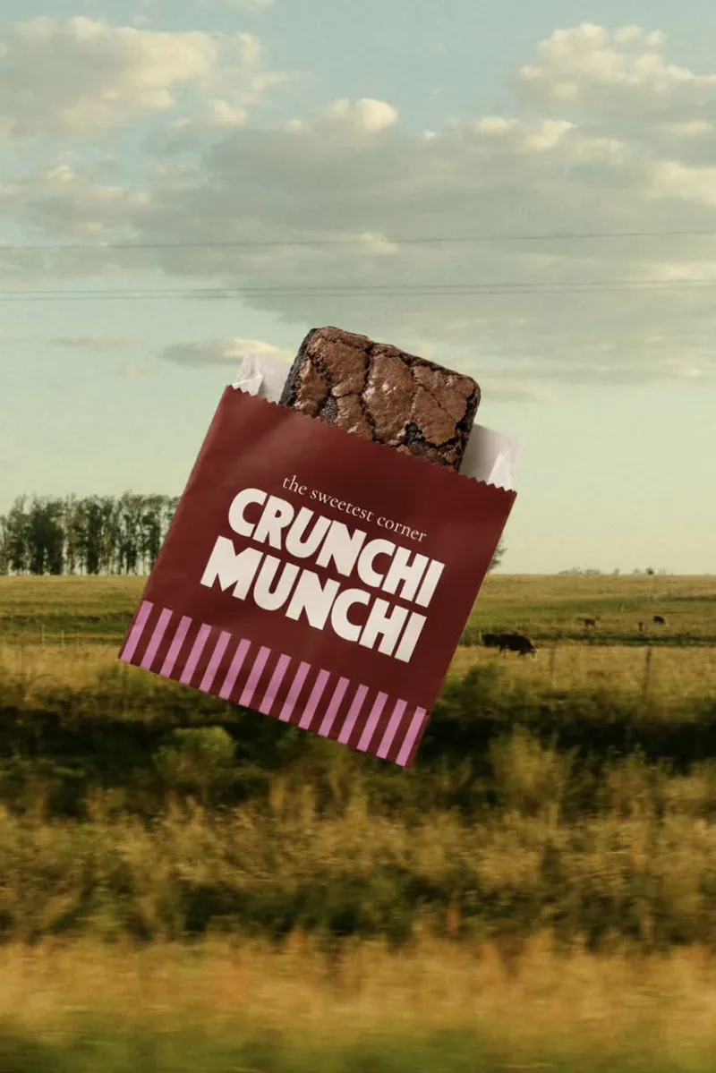 A Crunchi Munchi brownie bag flying over a Texas field